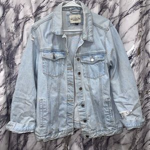 Distressed denim jacket light wash